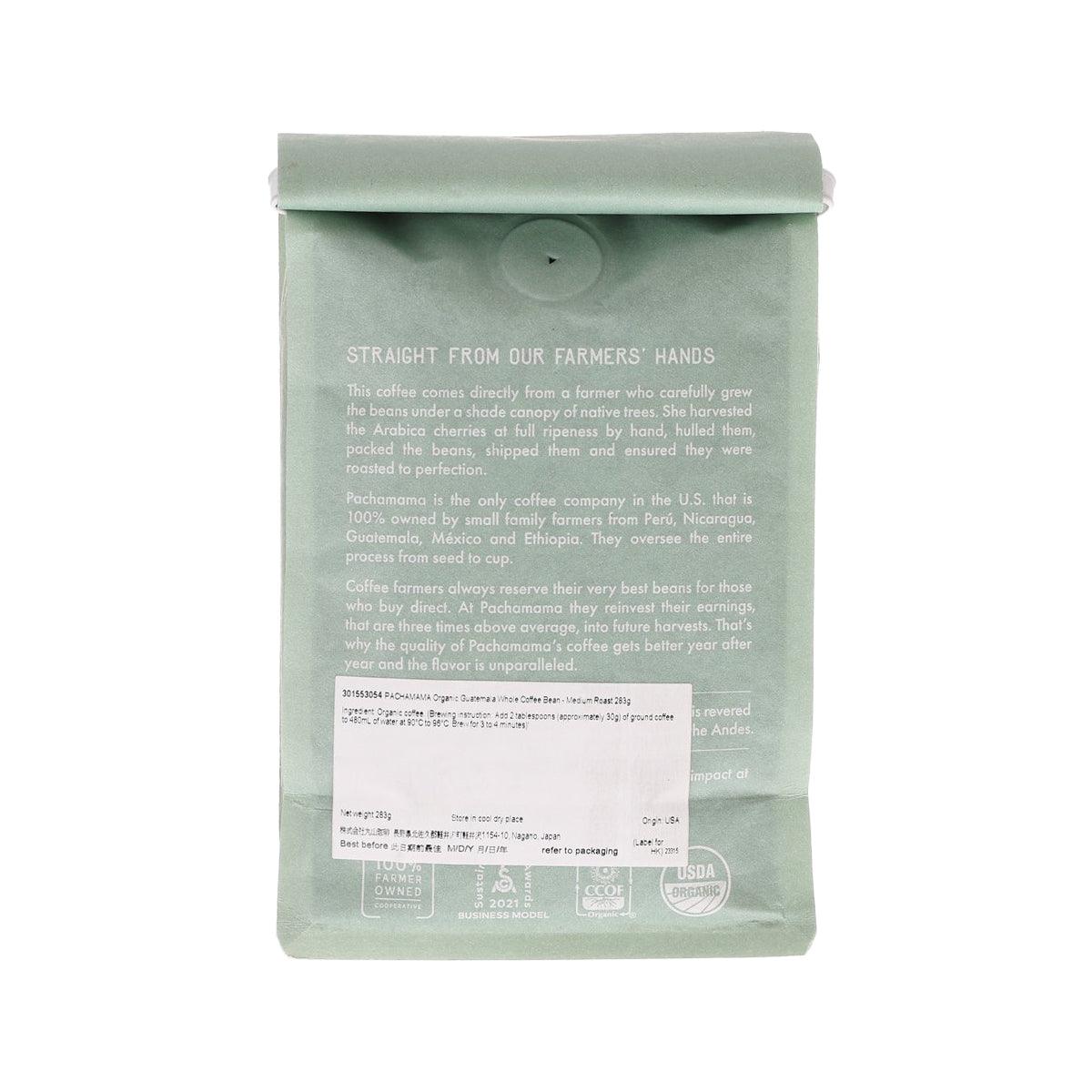 Mint green back of PACHAMAMA organic coffee bag with printed details and seals