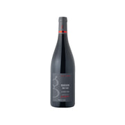 DOM GUEGUEN Burgundy Pinot Noir wine bottle, dark glass with gray screw cap.