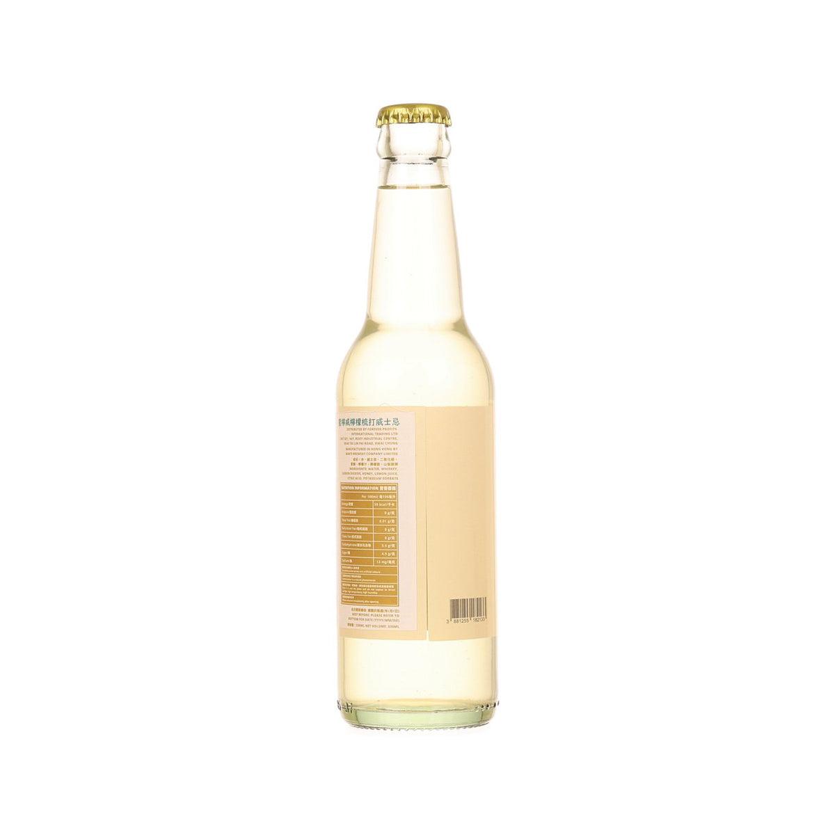 Lemonade whiskey highball bottle with gold cap, back label, barcode, pale yellow liquid