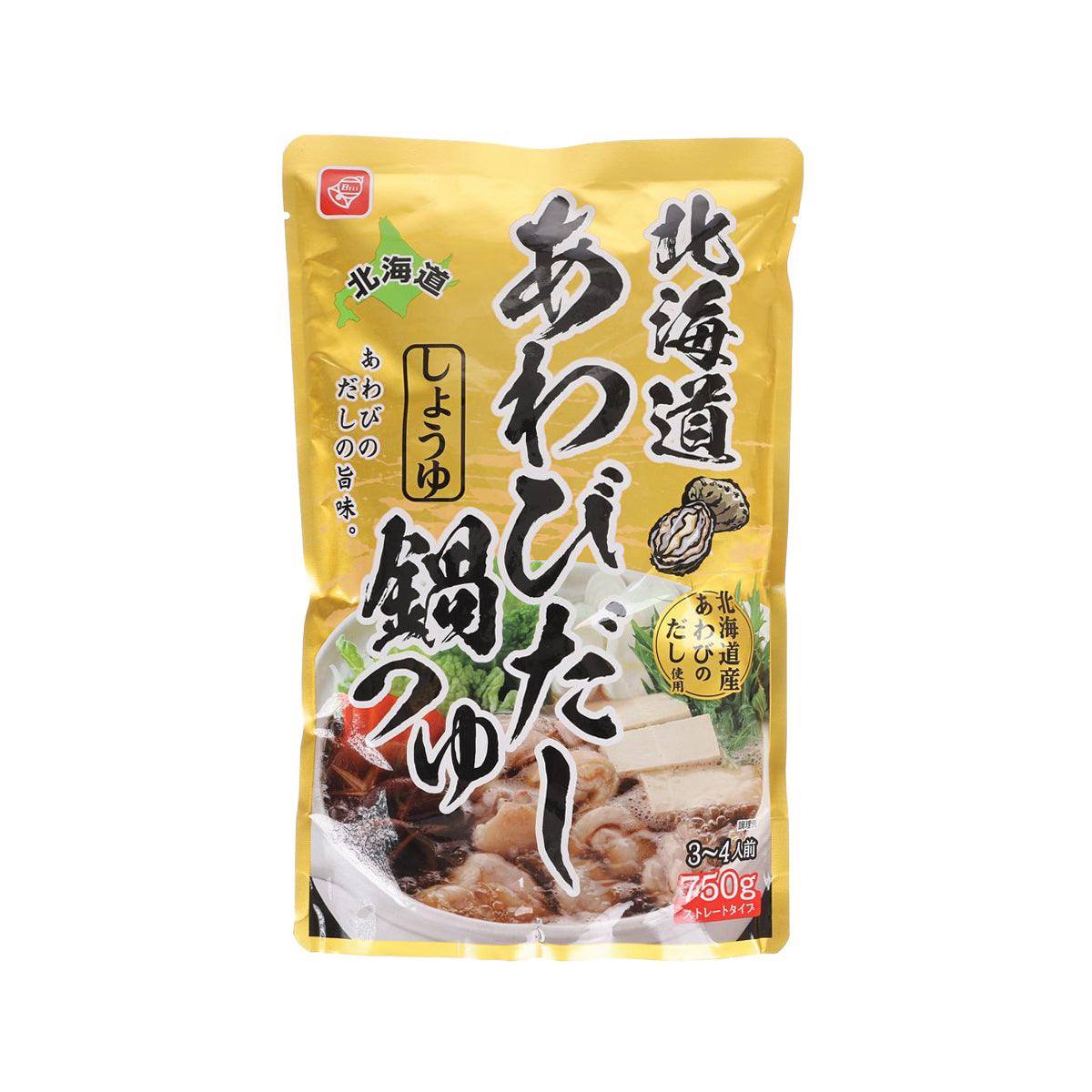 Hot pot soup base pouch with abalone soy sauce, yellow package, front view