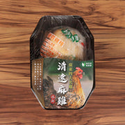 Packaged chilled whole chicken in clear tray with dark label