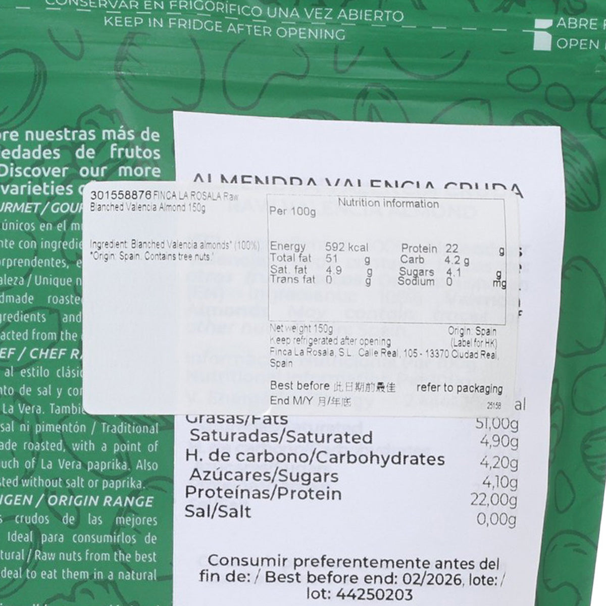 Label close-up on raw blanched Valencia almonds pouch showing nutrition facts