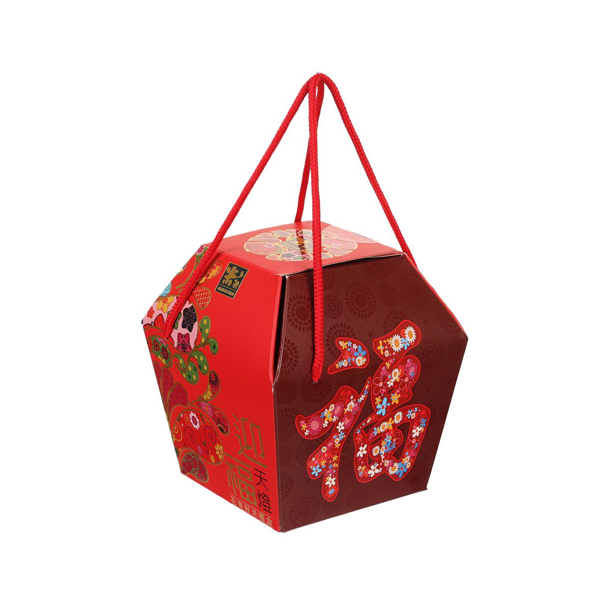Red and dark red hexagonal lantern gift bag with colorful side artwork and top handles