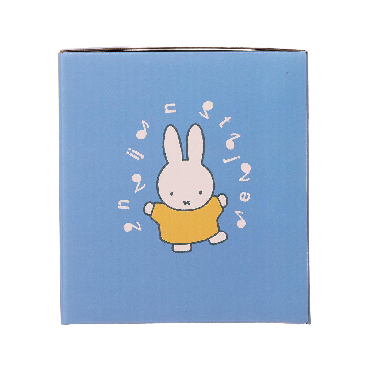 Blue Miffy rolling Christmas music box with rabbit dancing amid musical notes on the front