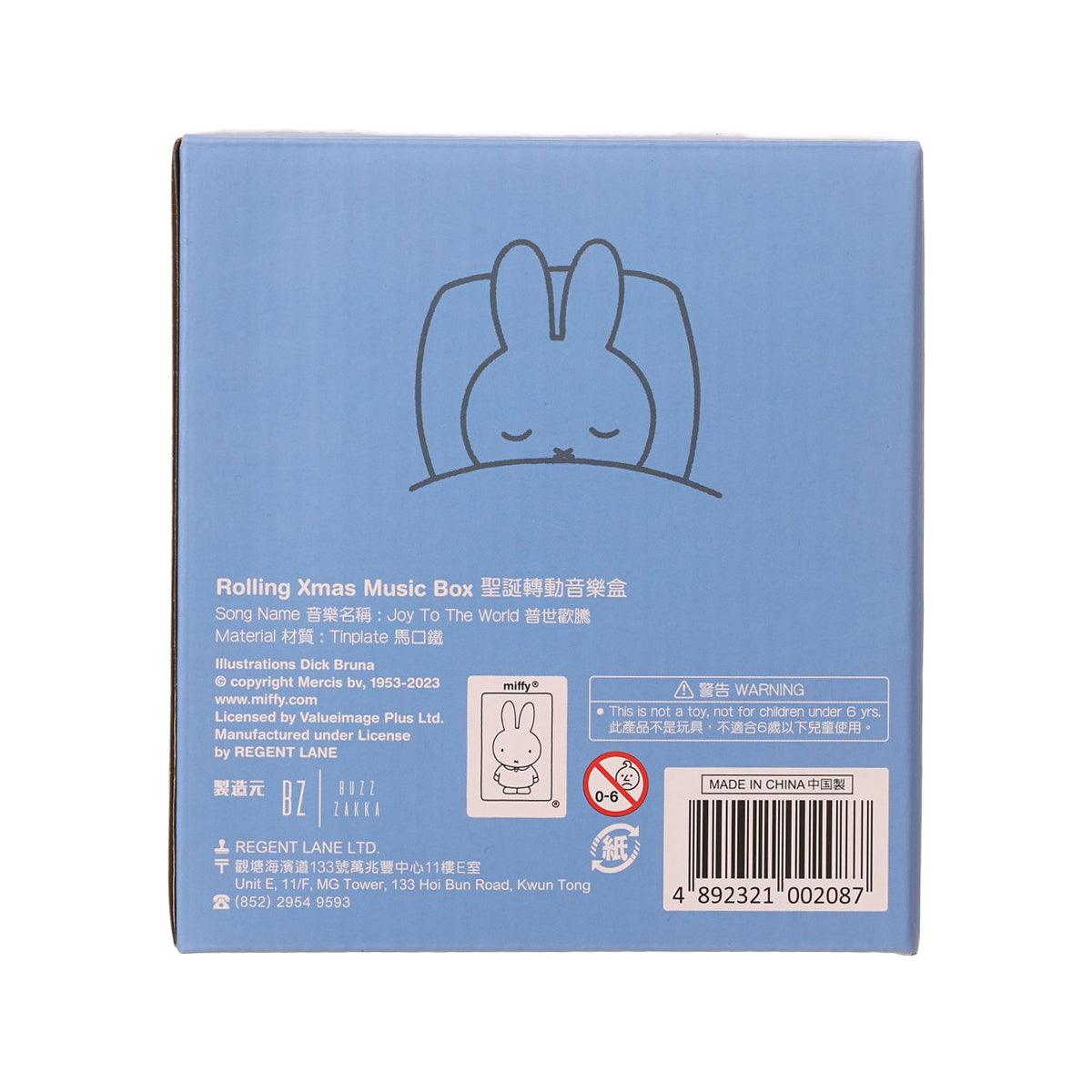 Back of blue Miffy rolling Christmas music box with printed details and label stickers