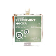 Whiskey cocktail bottle labeled Peppermint Mocha, clear glass with amber liquid