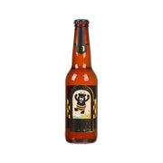 Amber honey lager beer bottle with front label and gold-toned cap