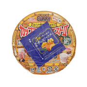 Nissin Cup Noodle Cheese Curry soup cup, showing lid-style top graphics