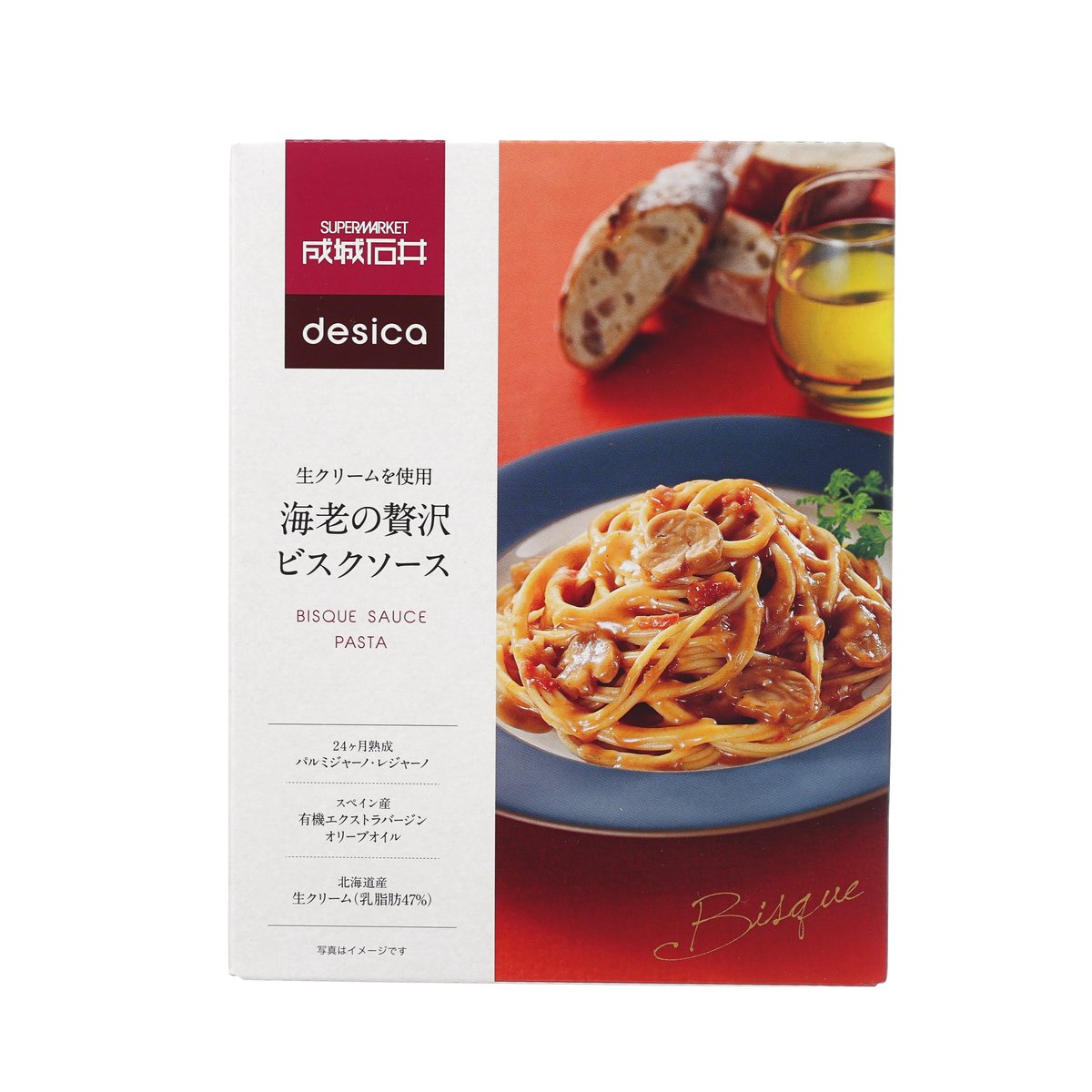 Shrimp bisque pasta sauce box with plated spaghetti on front