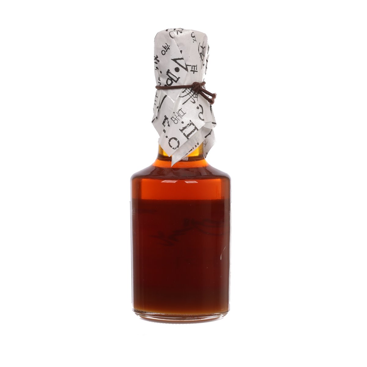 Premium sesame oil bottle, amber glass with wrapped cap