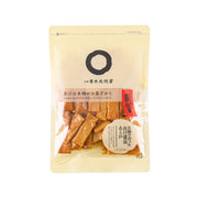 Soy sauce arare rice crackers in beige pouch with front label and visible cracker pieces