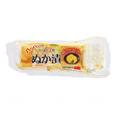 Rice bran pickled radish pouch, sealed white and yellow bag with orange filling