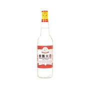Bottle of YUET WO premium rice wine, clear glass with red label and yellow cap (630 mL)