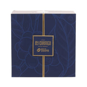 Coffee gift box with dark blue wrap and gold ribbon, BY CARMEN label on front