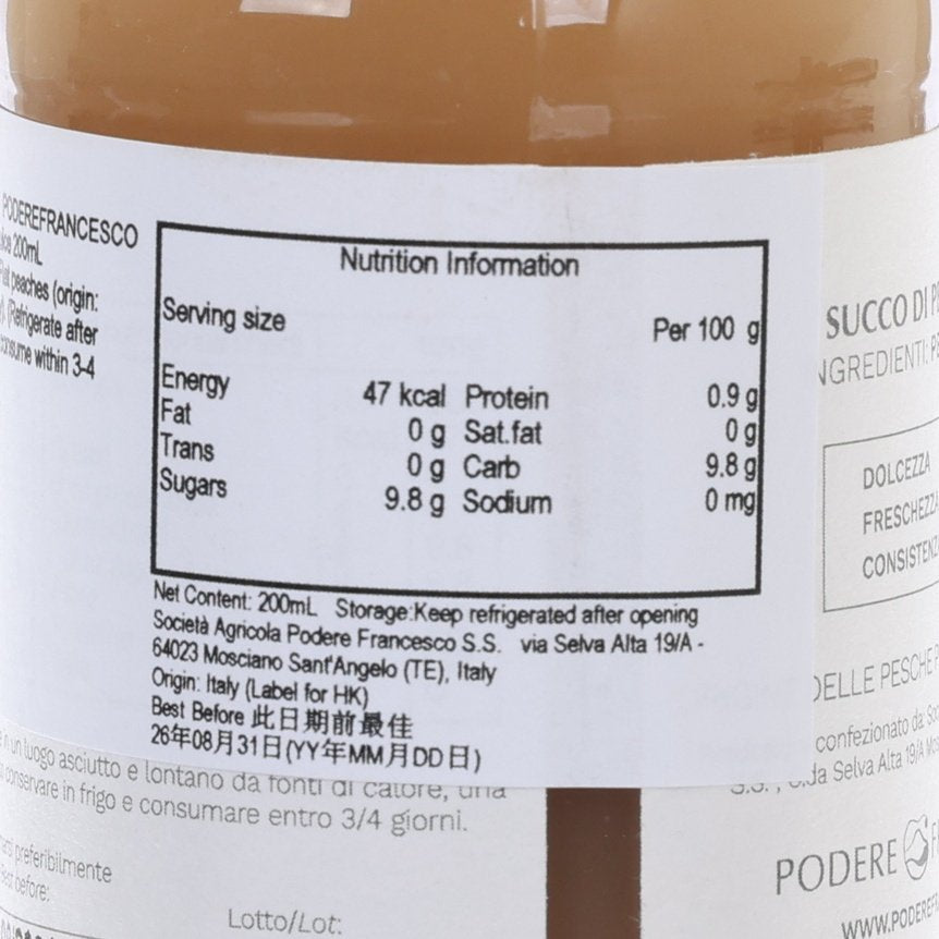 Peach juice label close-up with Nutrition Information box and serving size