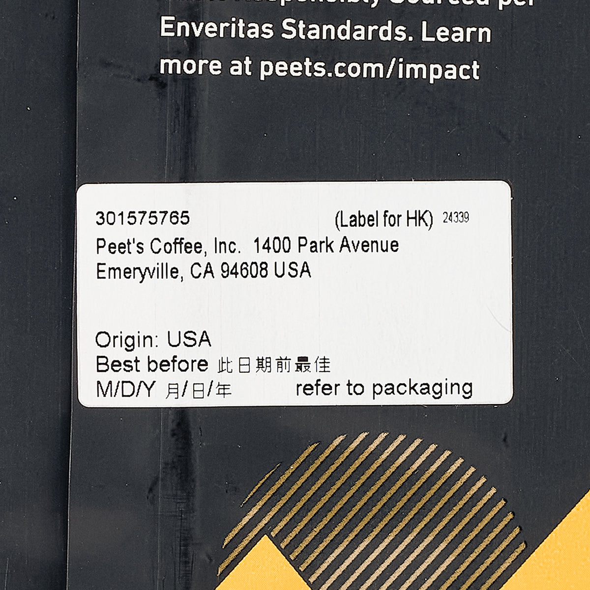 Ground coffee bag label close-up with origin USA and best before date text
