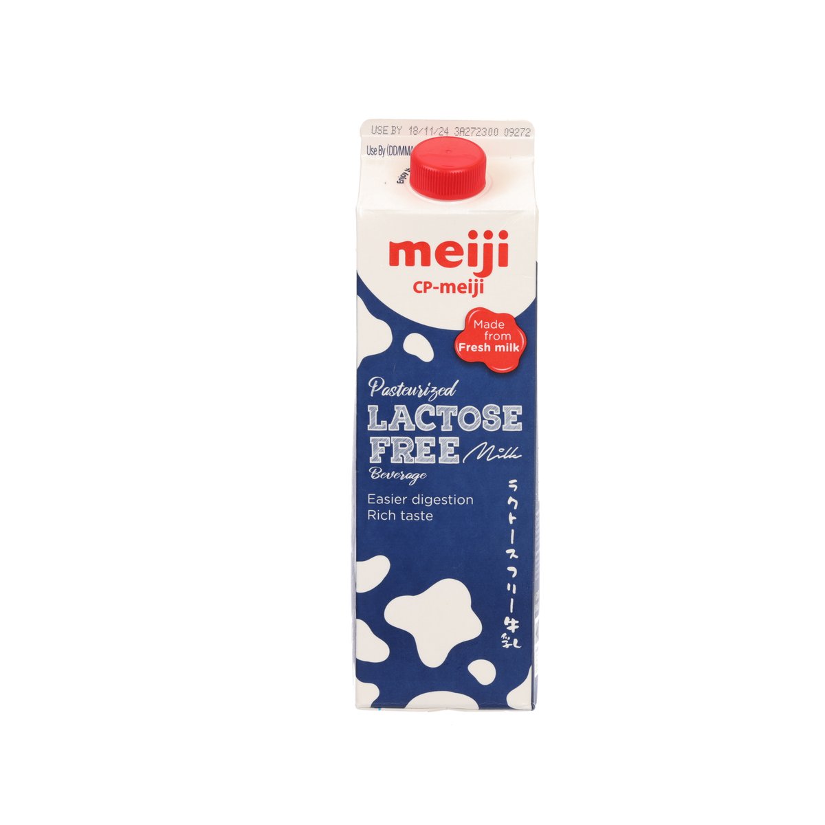 Lactose-free milk beverage carton with red cap, front label and cow graphic