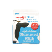 High calcium skimmed milk carton, 236 mL, blue label with cow graphic