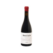 Wine bottle with red cap and dark glass, front label with Monte Gatun text