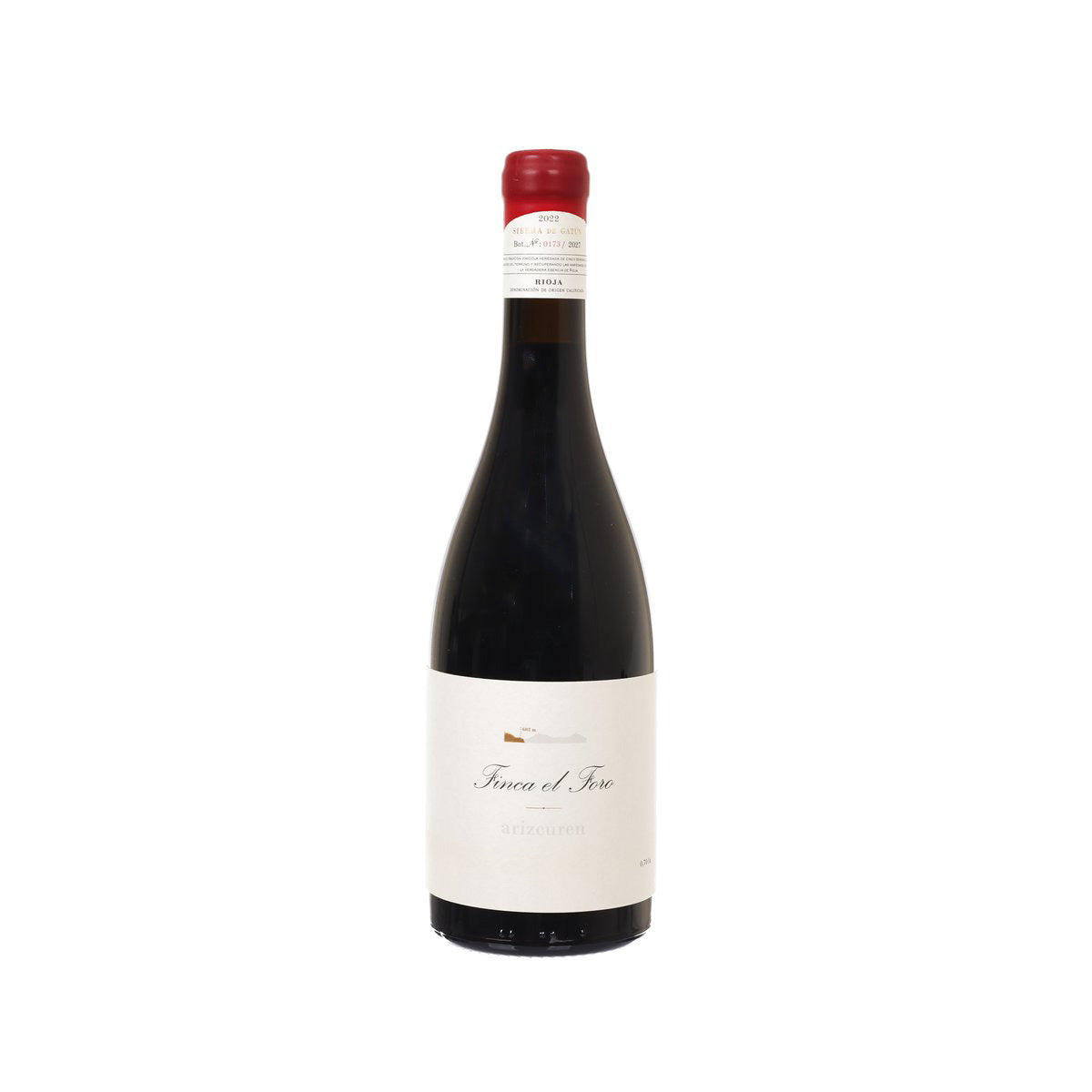 Wine bottle with red foil cap and light label reading Finca el Toro