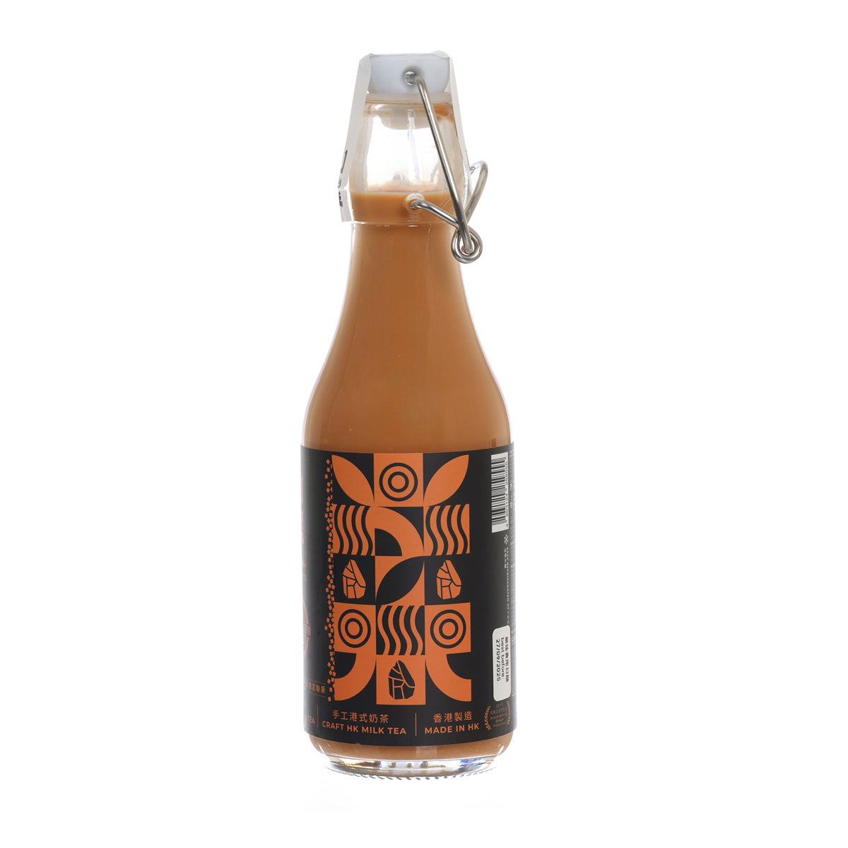 MTWAVES soy salt milk tea bottle, back view, orange glass with black label