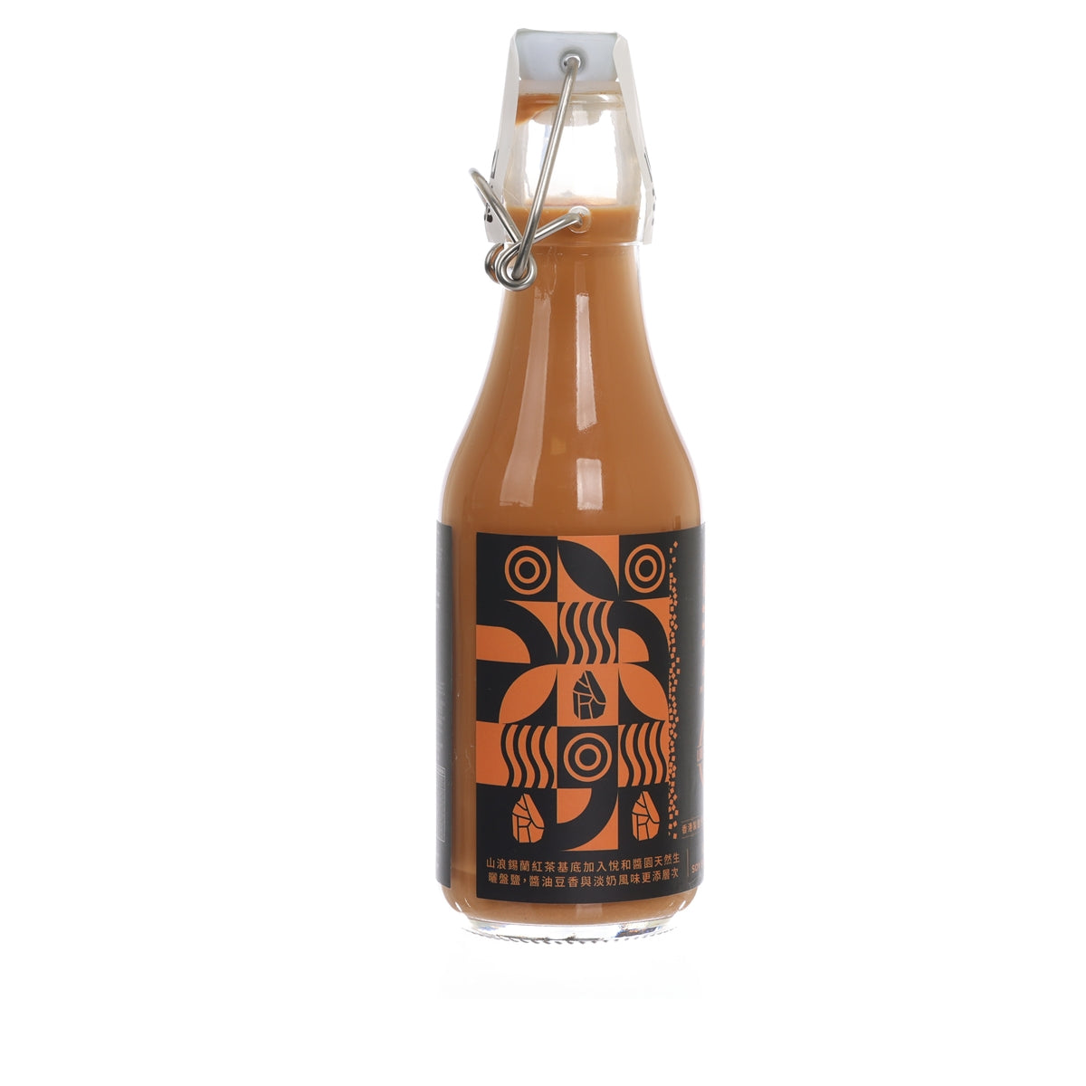MTWAVES soy salt milk tea bottle, front view, orange glass and black patterned label