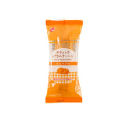 Caramel Baumkuchen stick pastry in orange sealed package