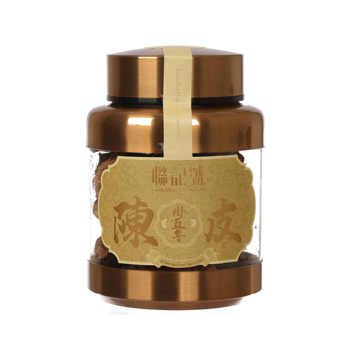 Dried tangerine peel in gold-lidded jar with ornate front label