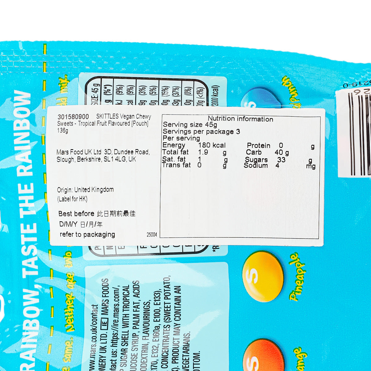SKITTLES Tropical sweets pouch close-up, nutrition facts panel and ingredients text