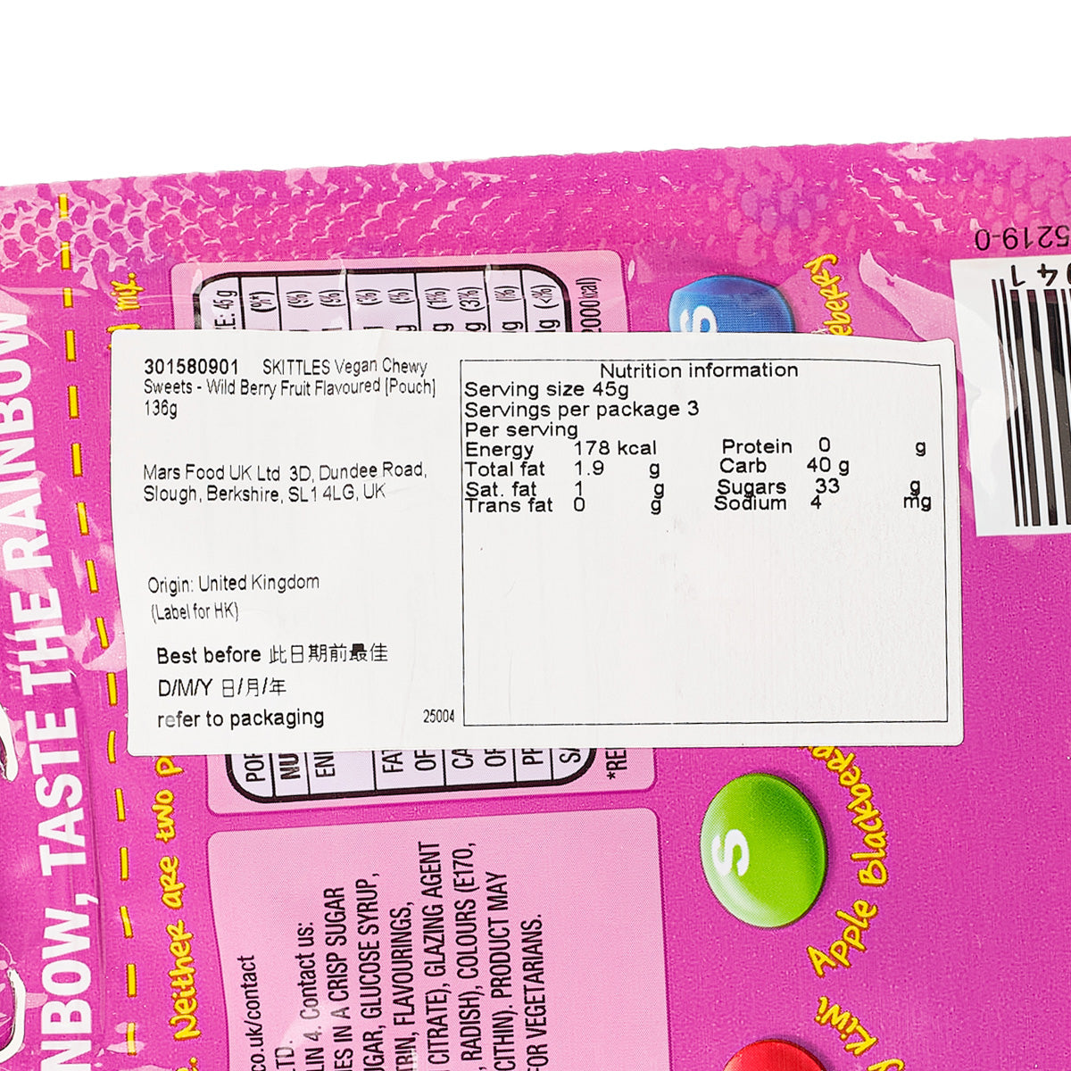 Skittles vegan chewy sweets pouch label close-up with ingredients and nutrition