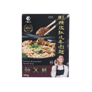 Premium braised beef noodle soup box, 590 g, with chopsticks and bowl graphic.