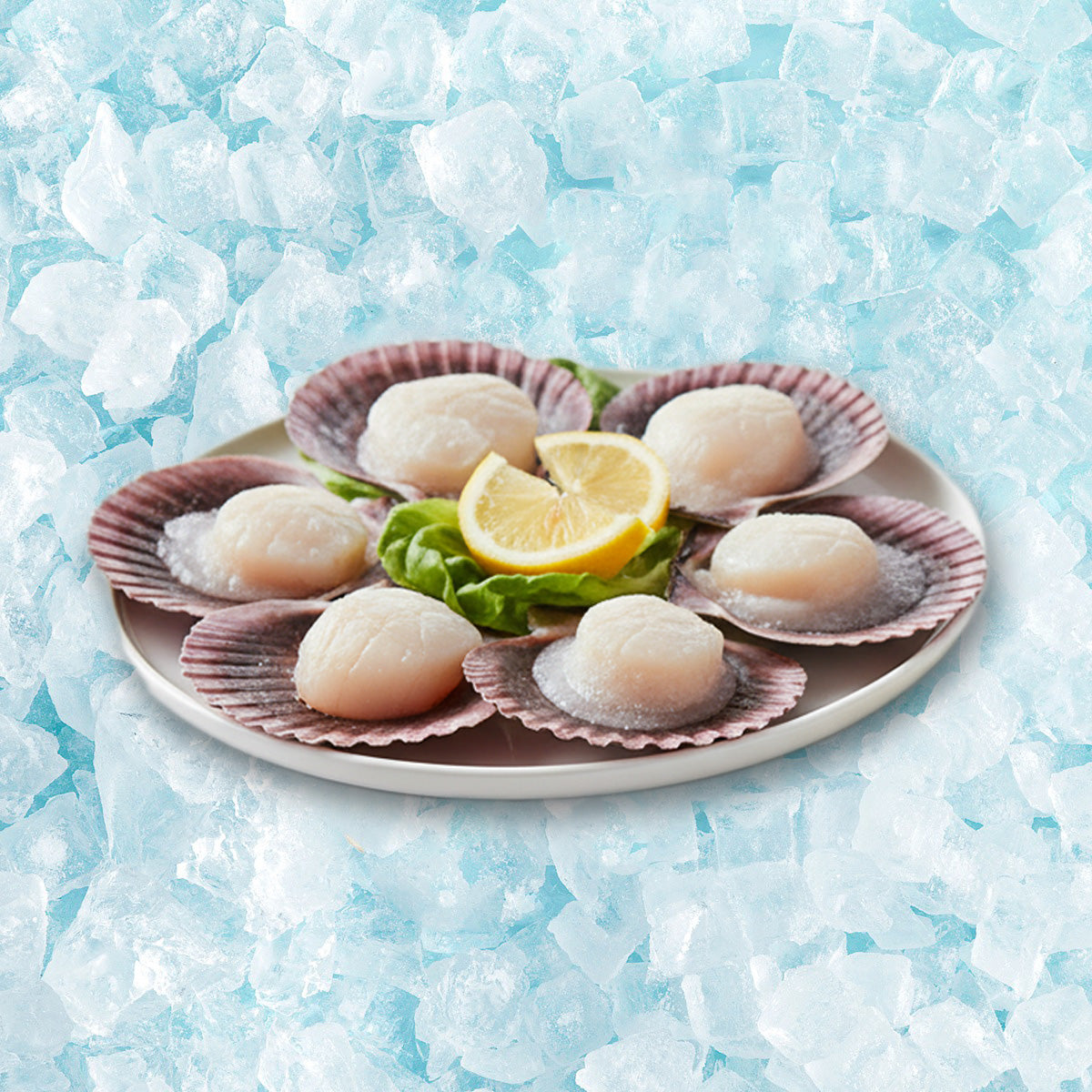 Frozen half shell scallops with lemon and greens on a serving plate