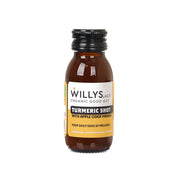 Organic turmeric shot bottle with apple cider vinegar, amber liquid, black cap