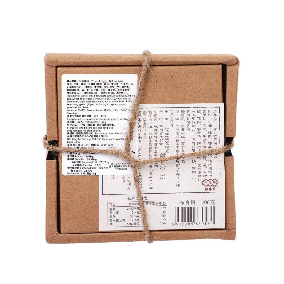 Back of hot pot base package with multiple labels and barcode, twine tie, 400 g
