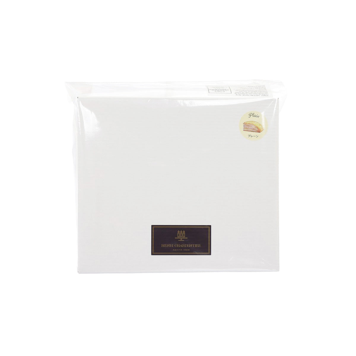 Sealed frozen plain mille-crepe cake in clear plastic bag with small front label