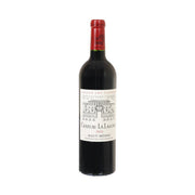 Red wine bottle with dark glass, red capsule, front label for Haut-Medoc