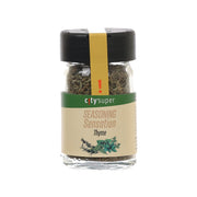 Thyme seasoning jar with black cap and clear glass bottle, dried thyme inside.