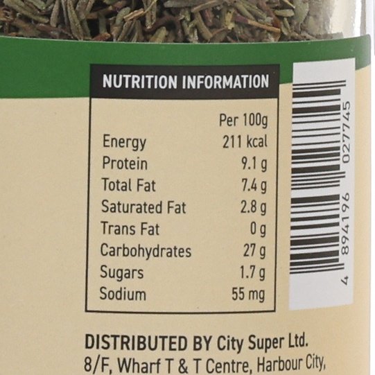 Nutrition information label on thyme seasoning bottle with per-100g values.