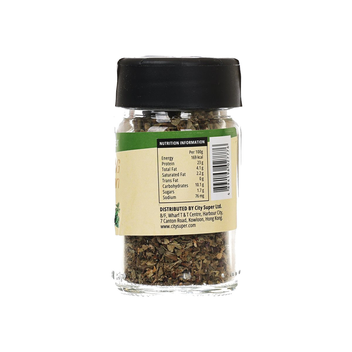 Basil seasoning jar with black cap and nutrition information label on green-and-cream