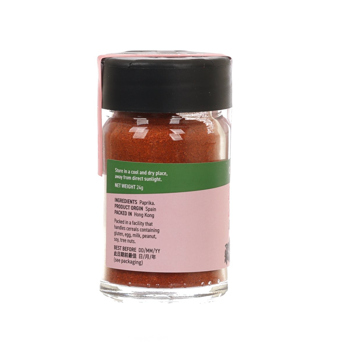 Sweet paprika seasoning bottle with ingredient and storage label on pink paper
