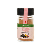 Cajun seasoning jar with black cap and green label, red seasoning name strip