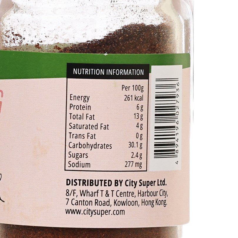 Ground cloves nutrition information label sticker on clear spice jar bottle.
