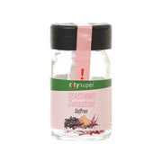 Saffron seasoning jar with black cap, clear glass bottle and pink label