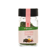 Chives seasoning jar with black lid and green herb flakes