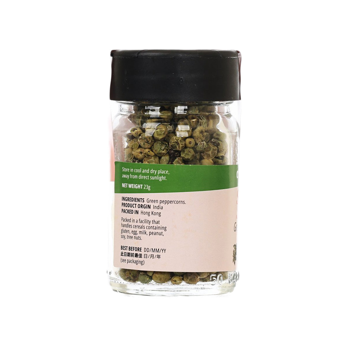 Green peppercorn jar with ingredient label on clear glass and black screw lid