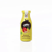 Bottle of LOME pomegranate, ginger & lemon juice, 200 mL with yellow cap
