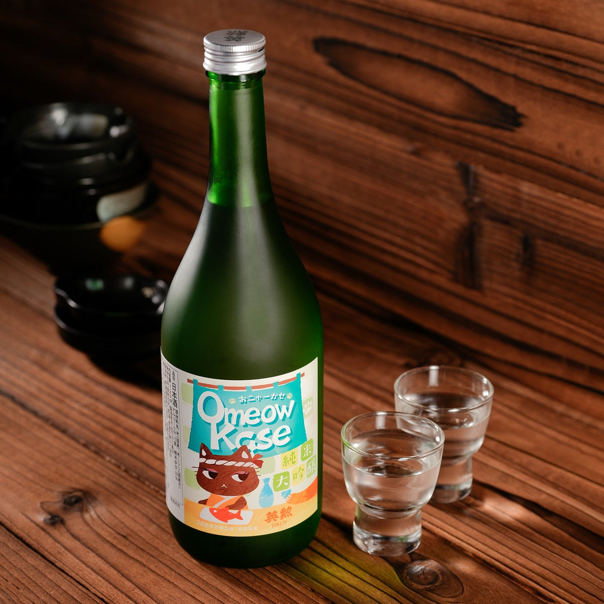Green sake bottle with silver cap and front label