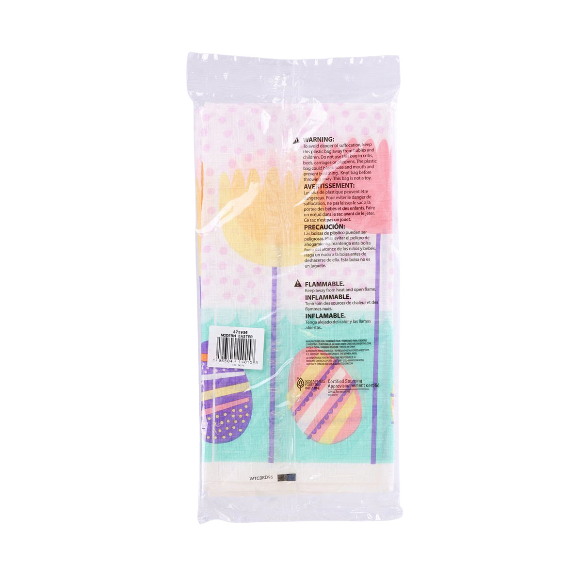 Back side of pastel Easter paper table cover with warning text and barcode