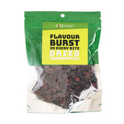 Dried cranberries in resealable pouch with green label; dark red berries inside.