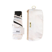 Mini foldable umbrella in off-white with matching fabric carrying pouch